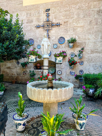 Courtyard with Fountain, Cross, and Statueの写真素材