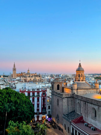 Seville Skyline at Dusk: Giralda and Churchesの写真素材