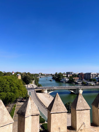 Seville River View with Bridges and Towersの写真素材
