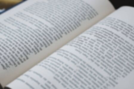 Opened old german book's pages blurred close-up backgroundの写真素材