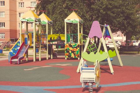 Summer colorful playground outdoors activity equipment backgroundの写真素材