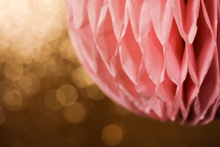 Close up origami honeycomb pom-pom paper ball christmas decoration backgroundの写真素材