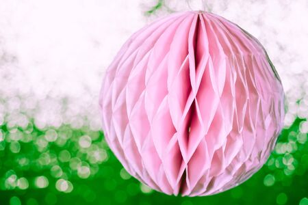 Close up origami honeycomb pom-pom paper ball christmas decoration backgroundの写真素材