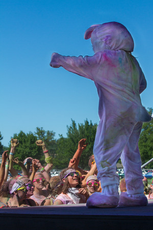 BOISE, IDAHO/USA - JUNE 22: A dressed up rabbit talks to the crowd after The Color Me Rad 5k in boise on June 22, 2013のeditorial素材