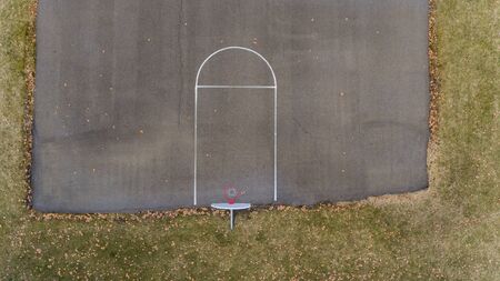 Old basketball court that has seen better daysの写真素材