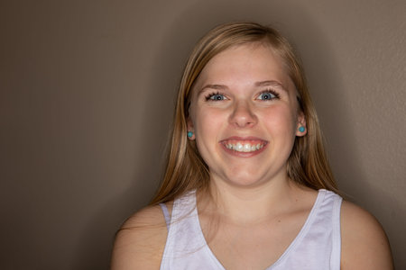 Girl with a huge smile on her face