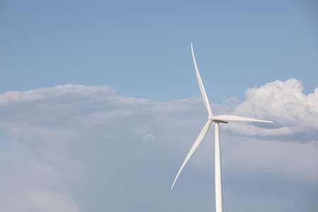 wind turbin producing energyの写真素材