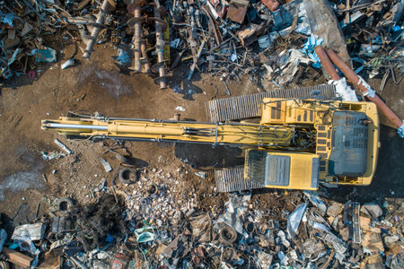 Excavator working on junk dump.Garbage the city. Soil pollution.