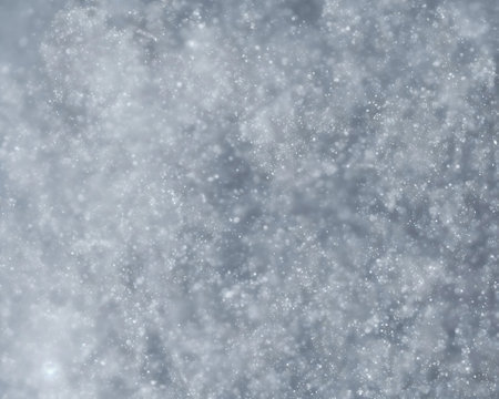 snow falling from the skyの写真素材