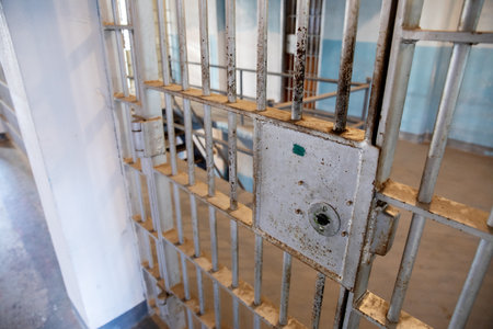 Prison Cell Door in Abandoned Facilityの写真素材