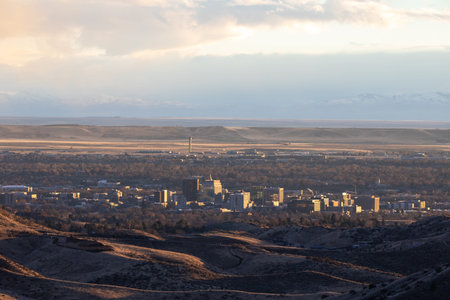 A city is visible in the distance with a mountain range in the forground