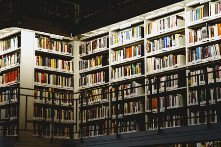 Upstairs corner full of books in a libraryの写真素材
