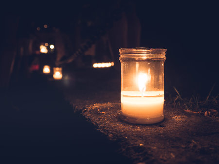 Sweet and warm candle with soft dark backgroundの写真素材