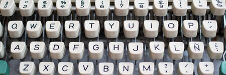 background with old white typewriter keysの写真素材