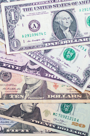 background with american dollar bills with different values