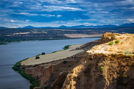 panoramic landscape of cliff with clouds in Toledo to the step of the Tajo river