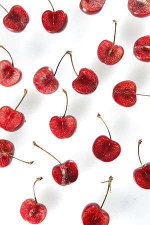 red cherry isolated on white background. Top view. Flat lay.の写真素材