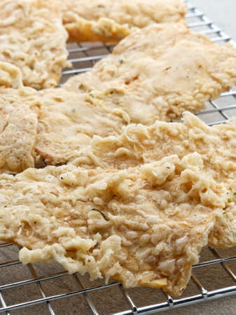 Keripik Tempe or Tempe chips, a typical Indonesian food made from thinly sliced ââtempeh and then fried using seasoned flour. It's salty and savory.の写真素材