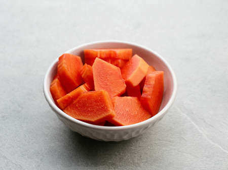 Healthy and fresh cut papaya fruit or sliced ââpapaya, served in a bowl.の写真素材