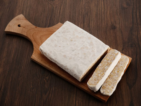 Raw Tempeh, Tempeh or Tempe, Indonesian traditional food, made from fermented soybeans. Usually...