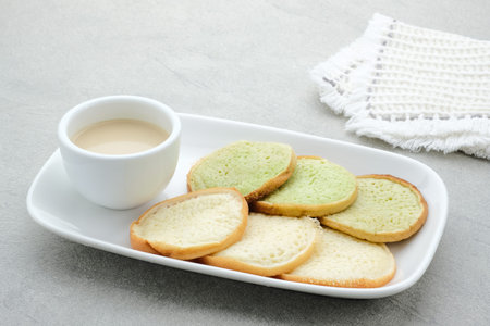 Serabi or Surabi,  Indonesian pancake made of flour, rice flour and coconut milk. Served with palm...