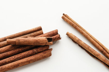 Kayu Manis or Cinnamon sticks isolated on white background.