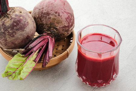 Healthy Beetroot juice, served in glass close up and copy space.