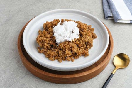 Tiwul, a traditional Indonesian food, is a staple food substitute for rice made from cassava. Usually eaten with a sprinkling of grated coconut.の写真素材