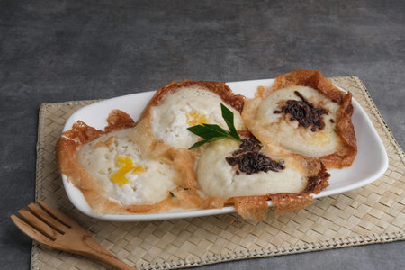 Serabi Solo, Indonesian traditional food made of flour, rice flour and coconut milk. Served in white...