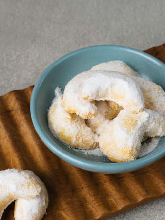 Kue Putri Salju or Snow White Cookies with crescent shaped. Made from flour, sugar and butter coated with powdered sugar. Popular to celebrate Eid al Fitr. Selective focus image.の写真素材