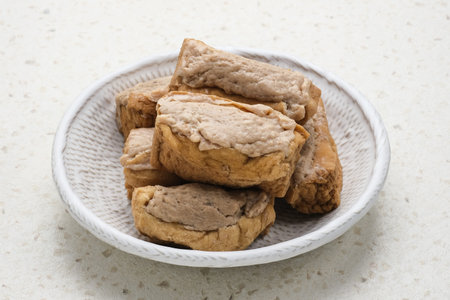 Tahu Bakso is a traditional snack made from tofu and beef. Suitable for snack in Ramadhan. Served in white plate. Selective focus image.の写真素材
