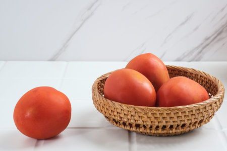 Fresh and organic tomatoes. Close up and selective focus. Copy space.