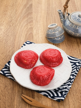 Ang Kue (Kue Ku) or Kue Thok, steamed Chinese pastry of glutinous rice flour with sweet mung bean...
