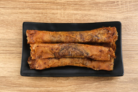 Pisang Coklat Lumer or Pisang Caramel is Indonesian traditional snack. Made of banana chocolate...