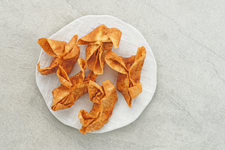 Pangsit, Pangsit Goreng, Delicious Pangsit Ayam Goreng (Chicken Fried Dumpling), Indonesian Traditional Food made from flour and chicken. Selective focus and close upの写真素材