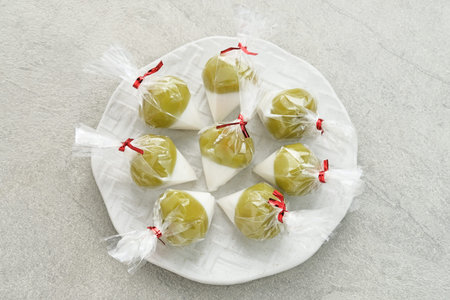 Kue Bugis or Kue Mendut, Indonesian traditional dessert made from glutinous rice flour, stuffed with...