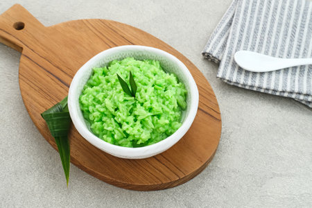 Tape Ketan Pandan is a typical Indonesian food made from fermented sticky rice. Served in small bowl. Selected focus.の写真素材