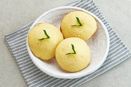 Kue Apem is Indonesian traditional snack, made from rice flour, coconut milk, and sugar. Selective...