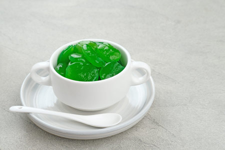 Manisan Kolang-Kaling, or preserved sugar palm fruit with green color, Indonesian drink and dessert...