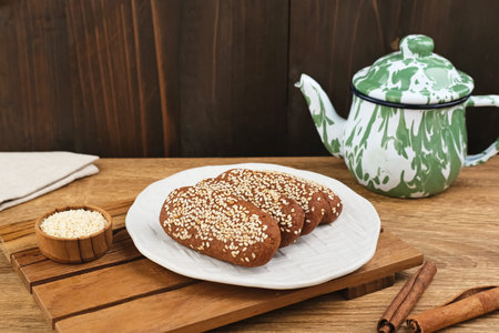Roti Gambang or Ganjel Rel is Indonesian traditional snack with sesame seeds, flavoured with...