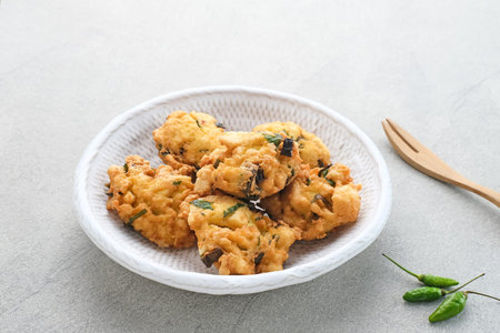 Perkedel Tahu, Made from mashed tofu, tapioca flour, spring onion, egg, salt and pepper. Served in...