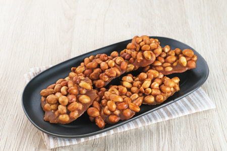 Ampyang Kacang or Gula Kacang, Indonesian traditional snack, made from peanuts and brown sugar. The taste of this snack is very sweet.の写真素材