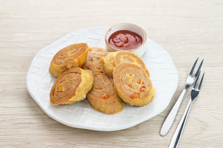 Chicken Egg rolls, made from mixtured minced chicken with tapioca, carrots, scallions and eggs then...