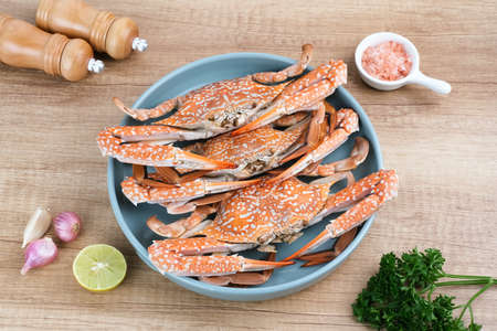 Steamed Blue Crab served on plate, food preparationの写真素材