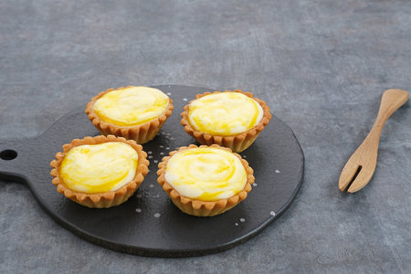 Golden Brown Fresh Cheese Tart served on plateの写真素材