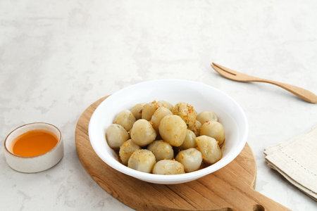 Cilok, traditional food from West Java, Indonesia, made from tapioca, chewy textured. Served with peanut sauce.の写真素材