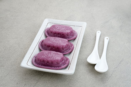 Ang Kue (Kue Ku) or Kue Thok, steamed Chinese pastry of glutinous rice flour with sweet mung bean...