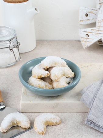 Kue Putri Salju or Snow White Cookies with crescent shaped. Made from flour, sugar and butter coated with powdered sugar.の写真素材