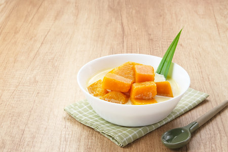 Kolak Waluh or Kolak Labu Kuning, Indonesian traditional food. Pumpkin in sweet coconut milk. Popular during ramadanの写真素材