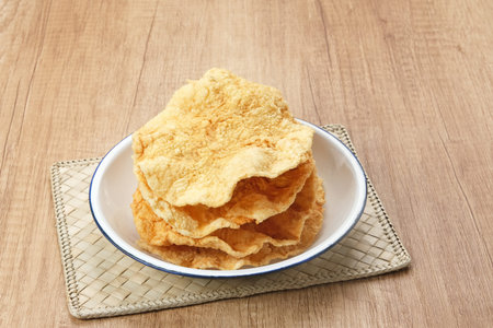 Emping, Indonesian traditional snack made from melinjo or belinjo seeds. Bitter and sweet tasteの写真素材
